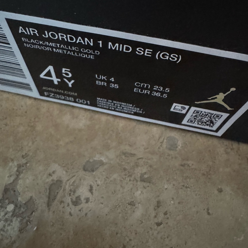 Air Jordan 1 Mid SE (GS) Black and Metallic/Silver Sneakers